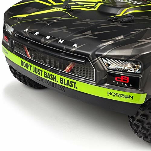 Close-up of ARRMA RC car front with green and black design.