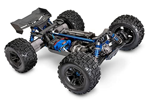 RC monster truck chassis with visible internal components and wheels.