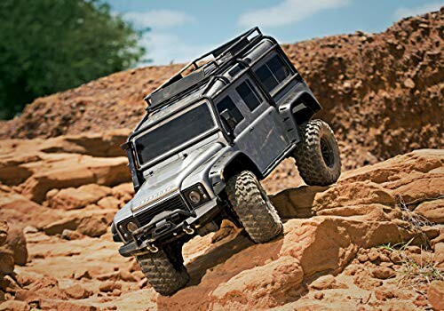 RC off-road vehicle climbing rocky terrain