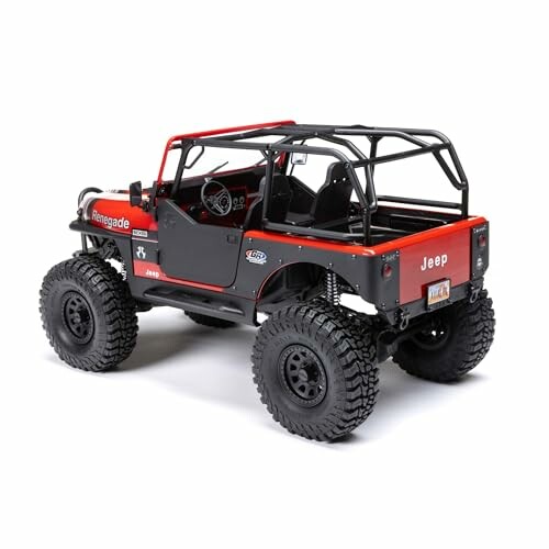 Red Jeep Wrangler toy car with off-road tires.