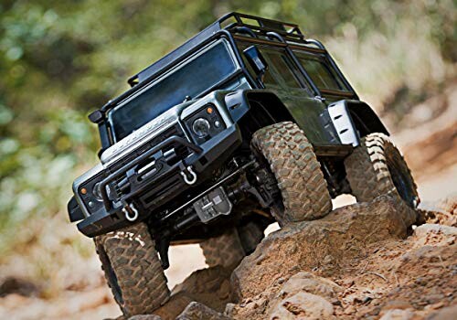 Remote control off-road truck on rocky terrain